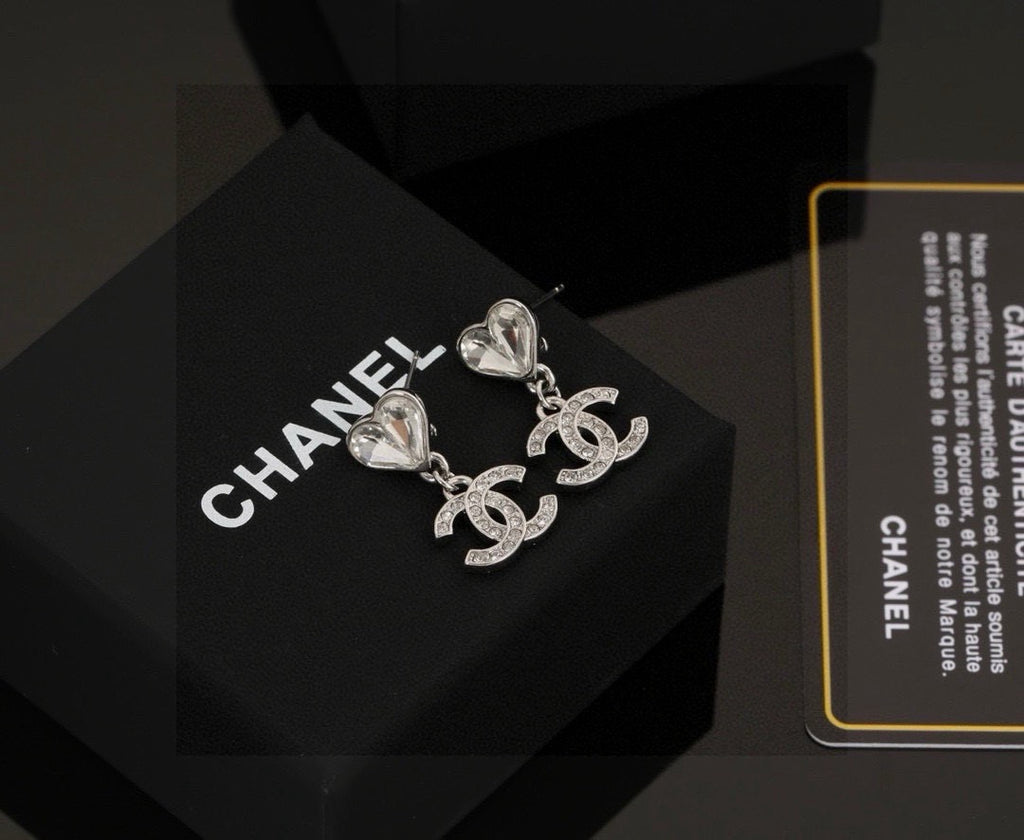 Chanel Interlocking C Heart Earrings - album image 1