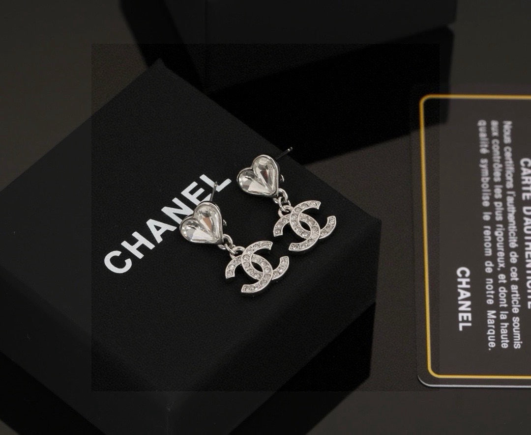 Chanel Interlocking C Heart Earrings - album image 1