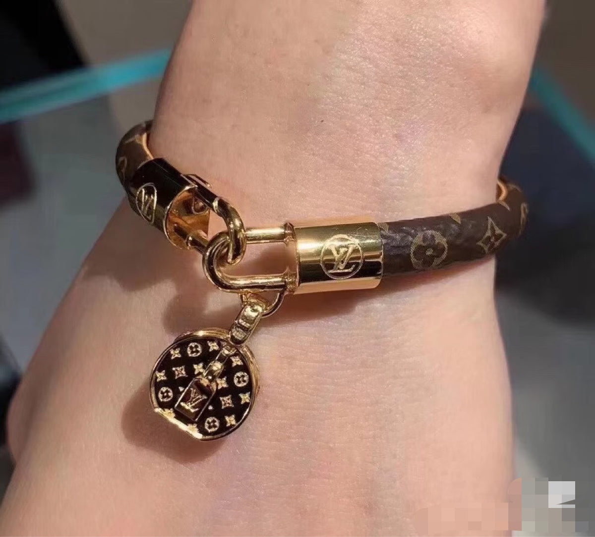 Louis Vuitton Circle Gold-Tone Leather Bangle - album image 1