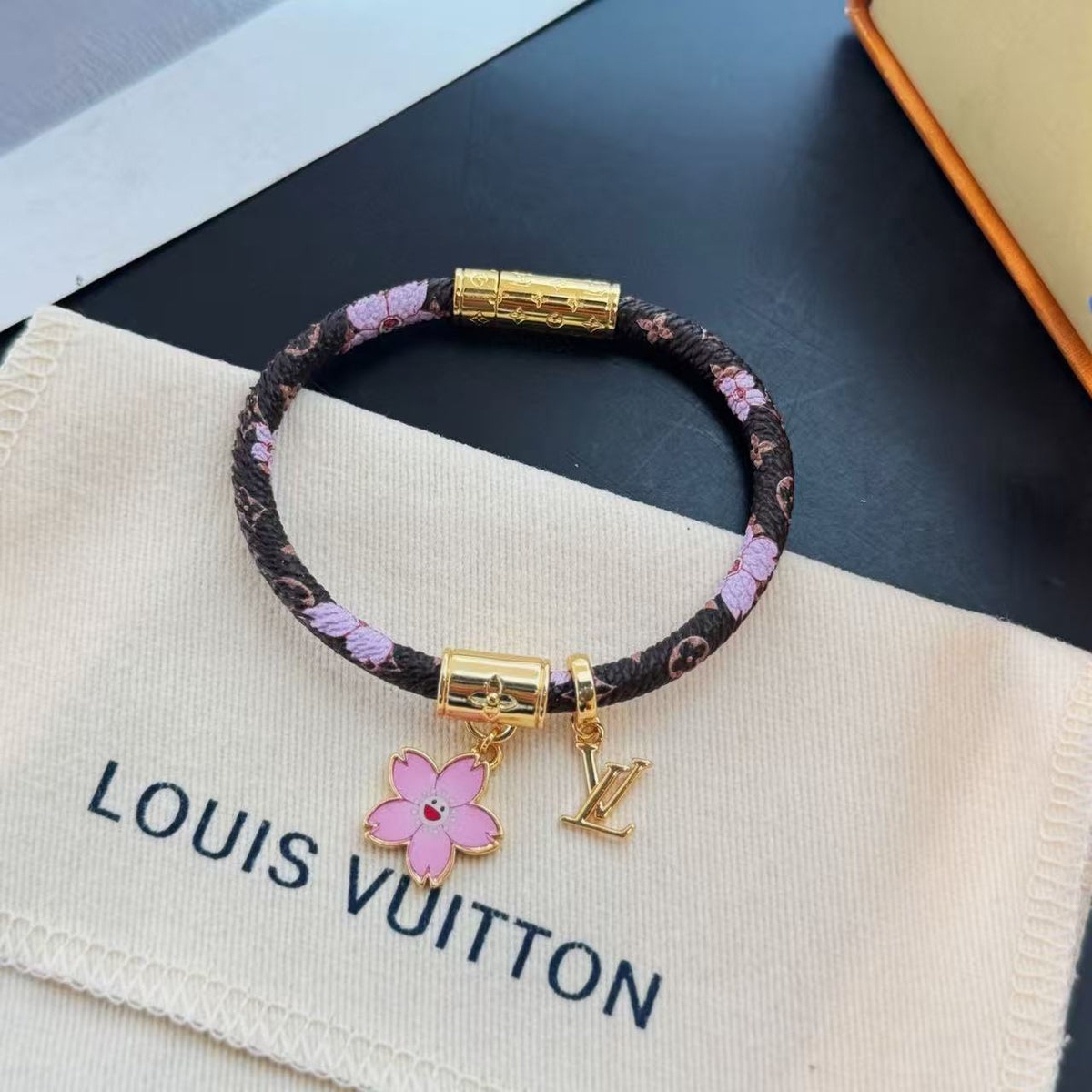 Louis Vuitton Gold-Tone Cherry Blossom Leather Bangle - album image 1