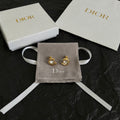 Dior Gold-Tone Sculpted Oval Stud Earrings - product image 1
