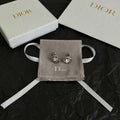 Dior Silver-Tone Sculpted Oval Stud Earrings - product image 1