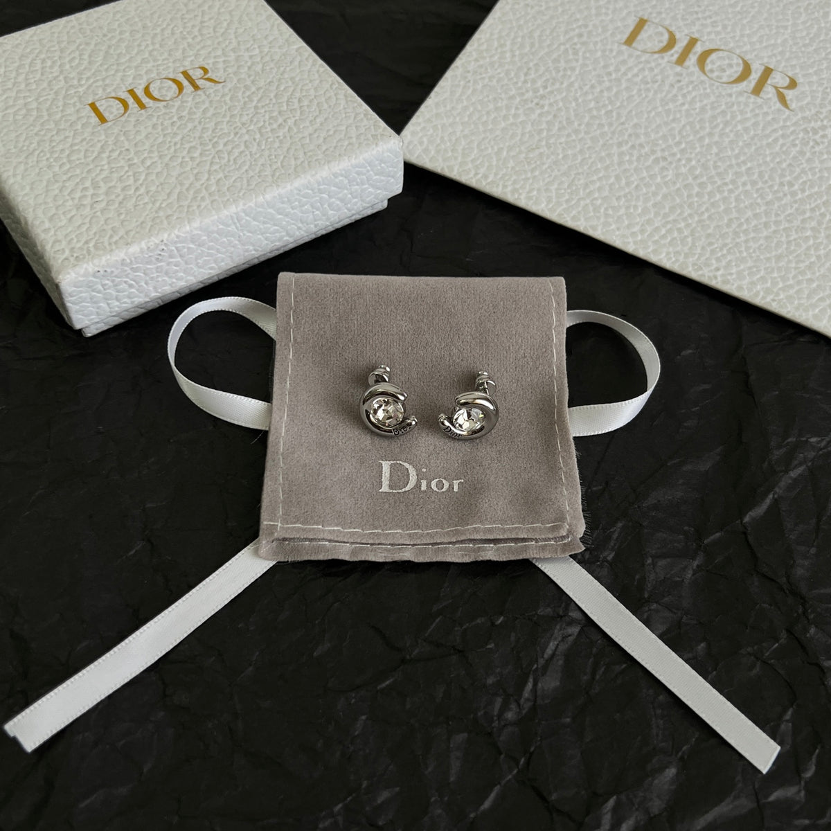 Dior Silver-Tone Sculpted Oval Stud Earrings - product image 1