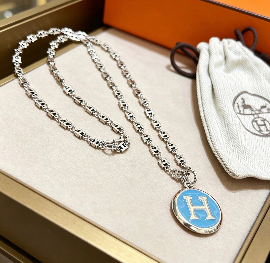 Hermès Silver-Tone Blue H Disc Necklace - album image 1