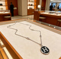Hermès Silver-Tone Black H Disc Necklace - album image 1