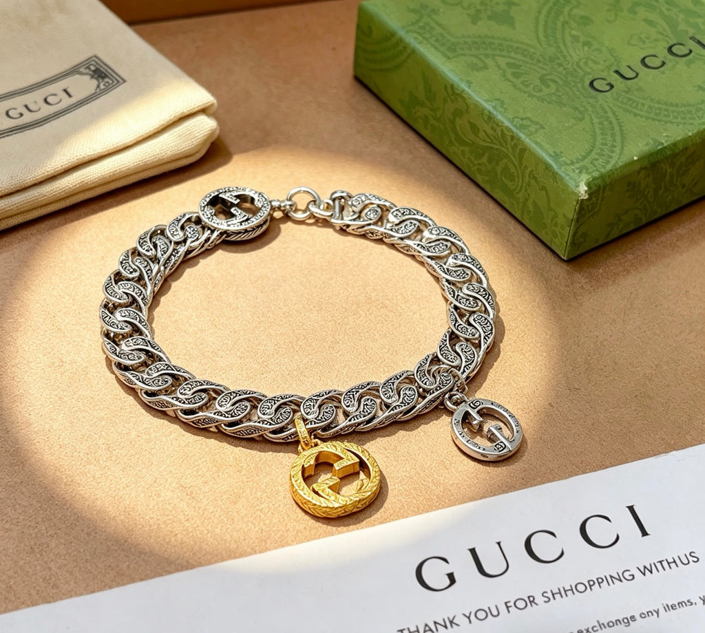 Gucci Silver-Tone Cuban Link Bracelet with Two-Tone G Charm - album image 1