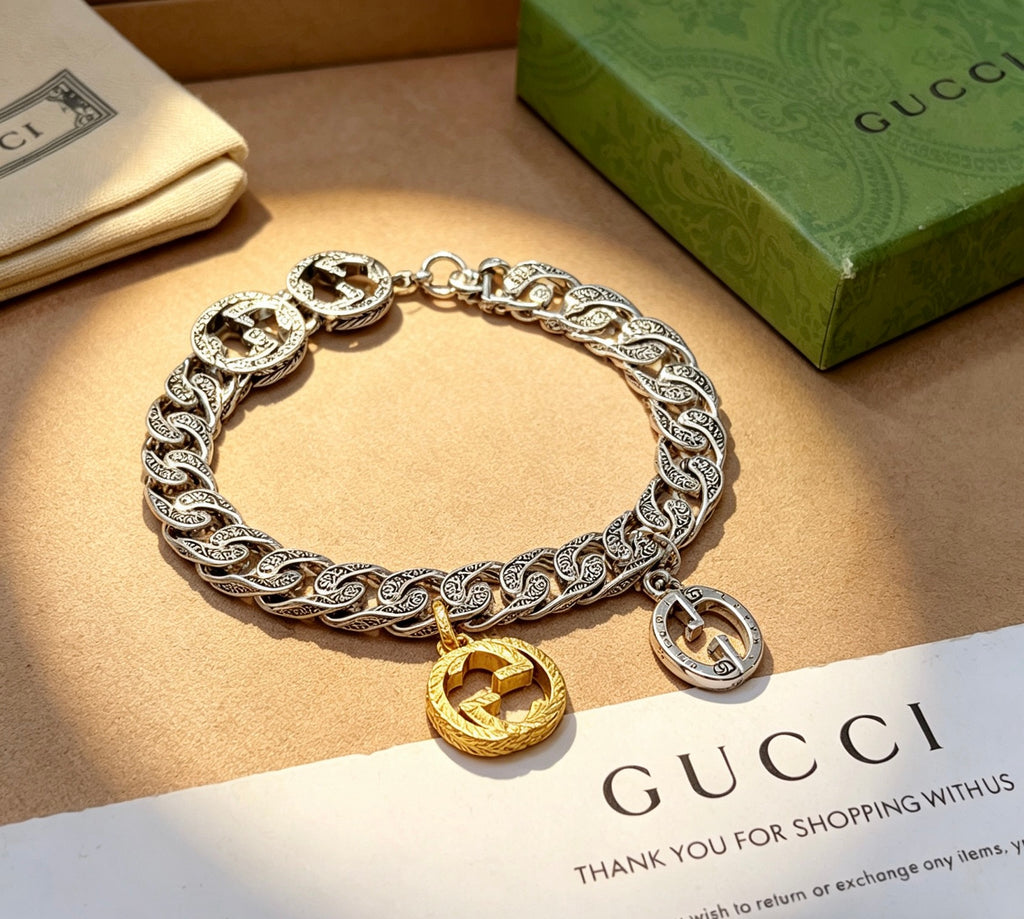 Gucci Silver-Tone Cuban Link Bracelet with Two-Tone G Charm - album image 5