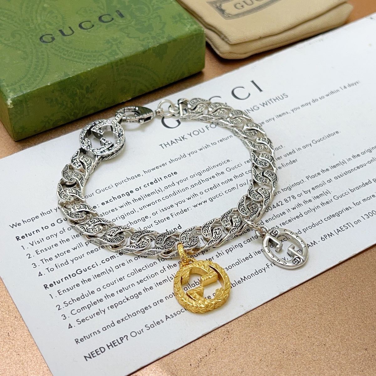 Gucci Silver-Tone Cuban Link Bracelet with Two-Tone G Charm - album image 4