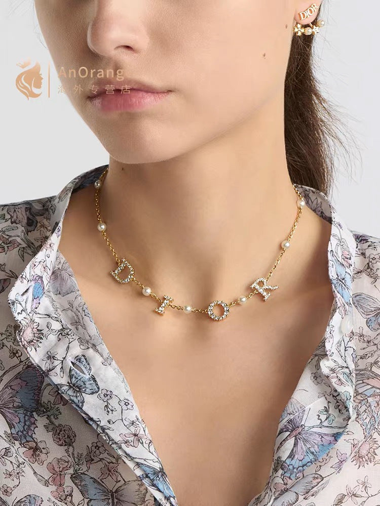 Dior Crystal Spaced Letter Jewelry - product image 2