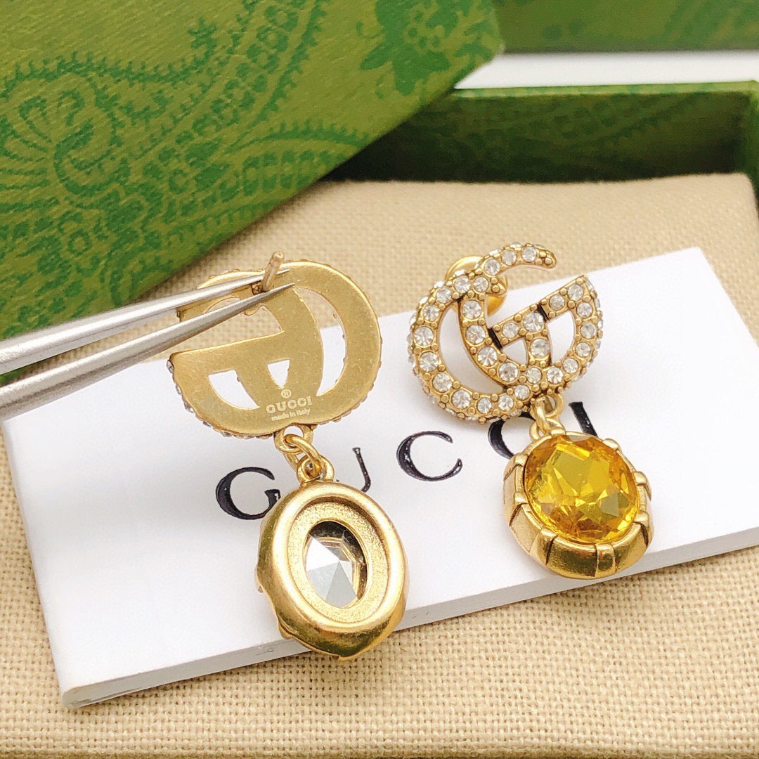 Gucci Interlocking G Antique Gold-Tone Black Antiqued Earrings - album image 1