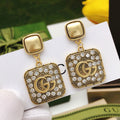 Gucci Pendant Crystal Accent Earrings - album image 1