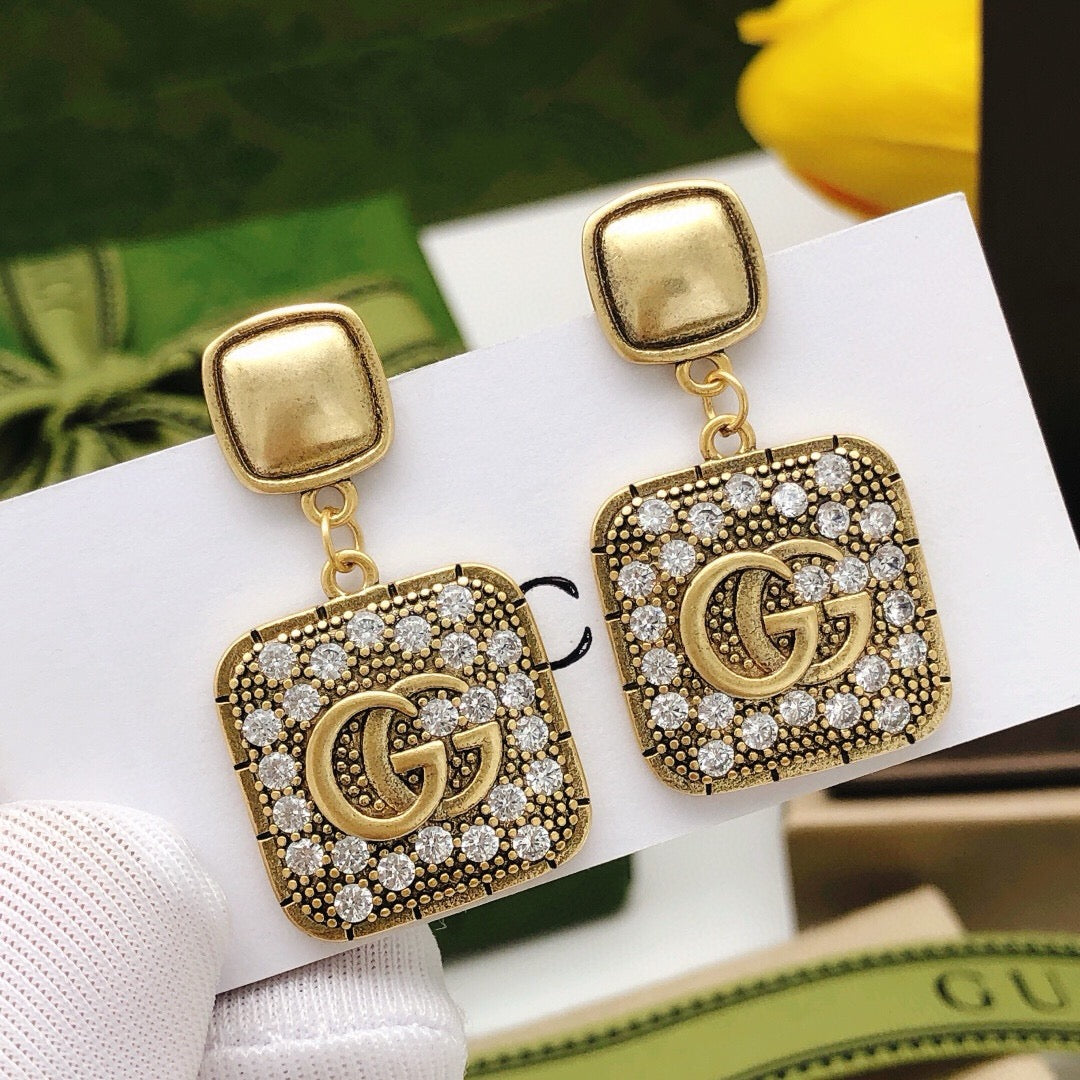 Gucci Pendant Crystal Accent Earrings - album image 1