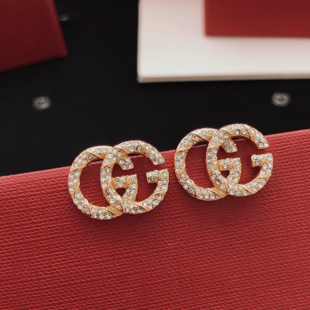 Gucci Rose Red Twisted Earrings - album image 1