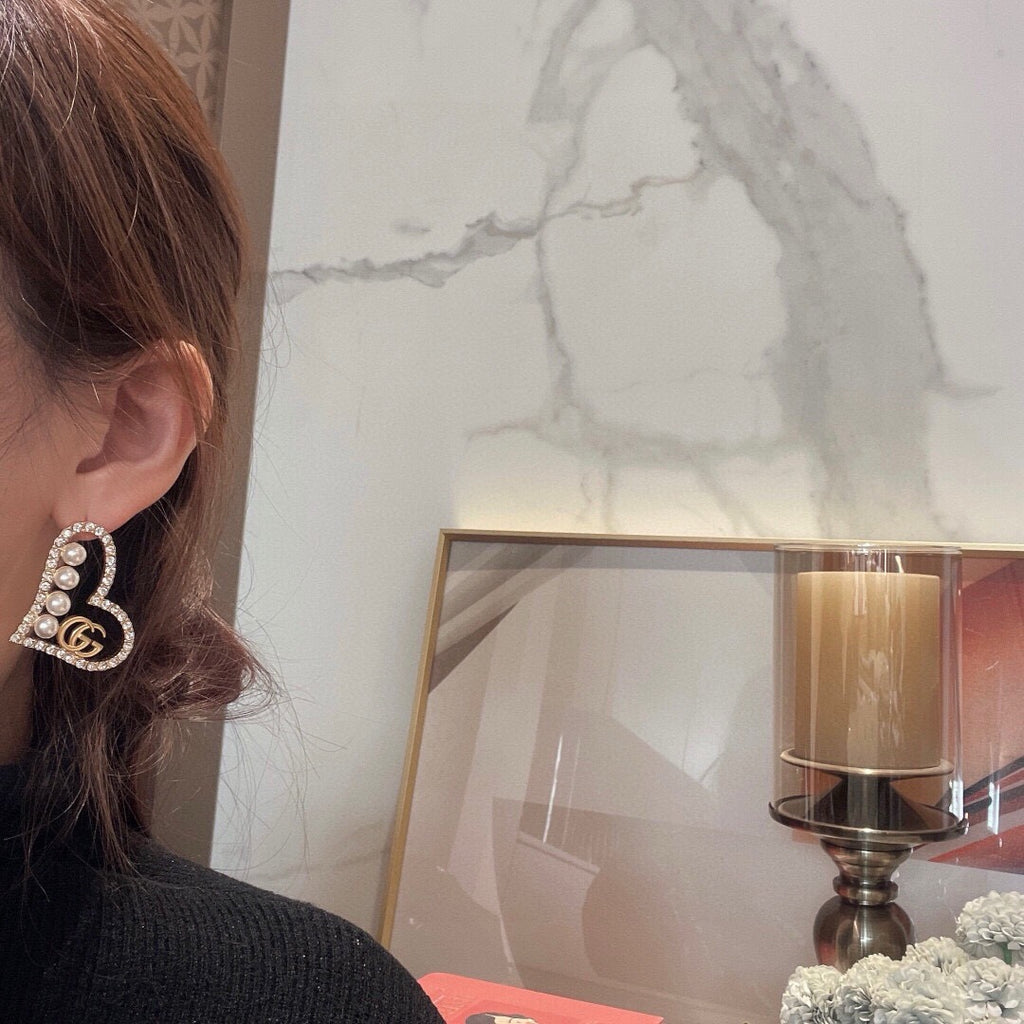 Gucci Interlocking G Heart Earrings - album image 2