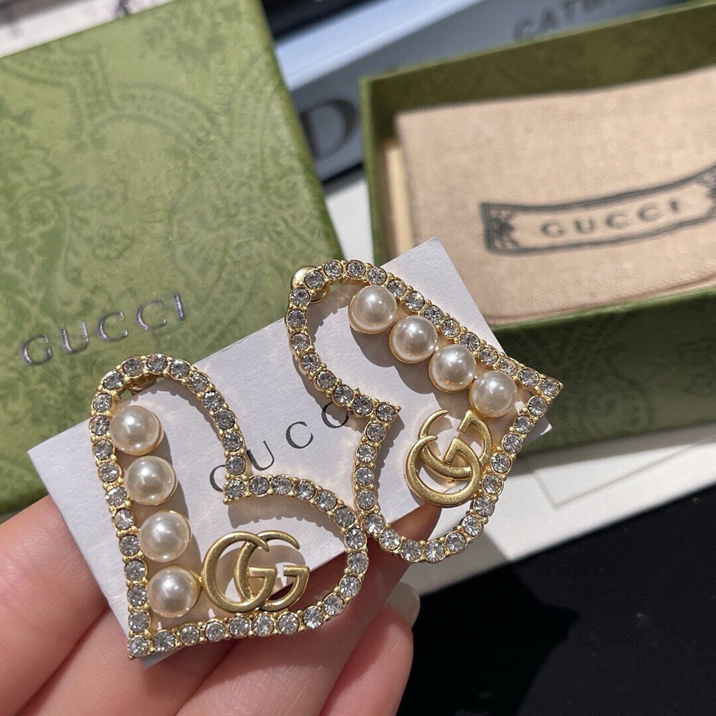 Gucci Interlocking G Heart Earrings - album image 1