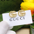 Gucci Interlocking G Crystal Accent Polished Mini Earrings - album image 1