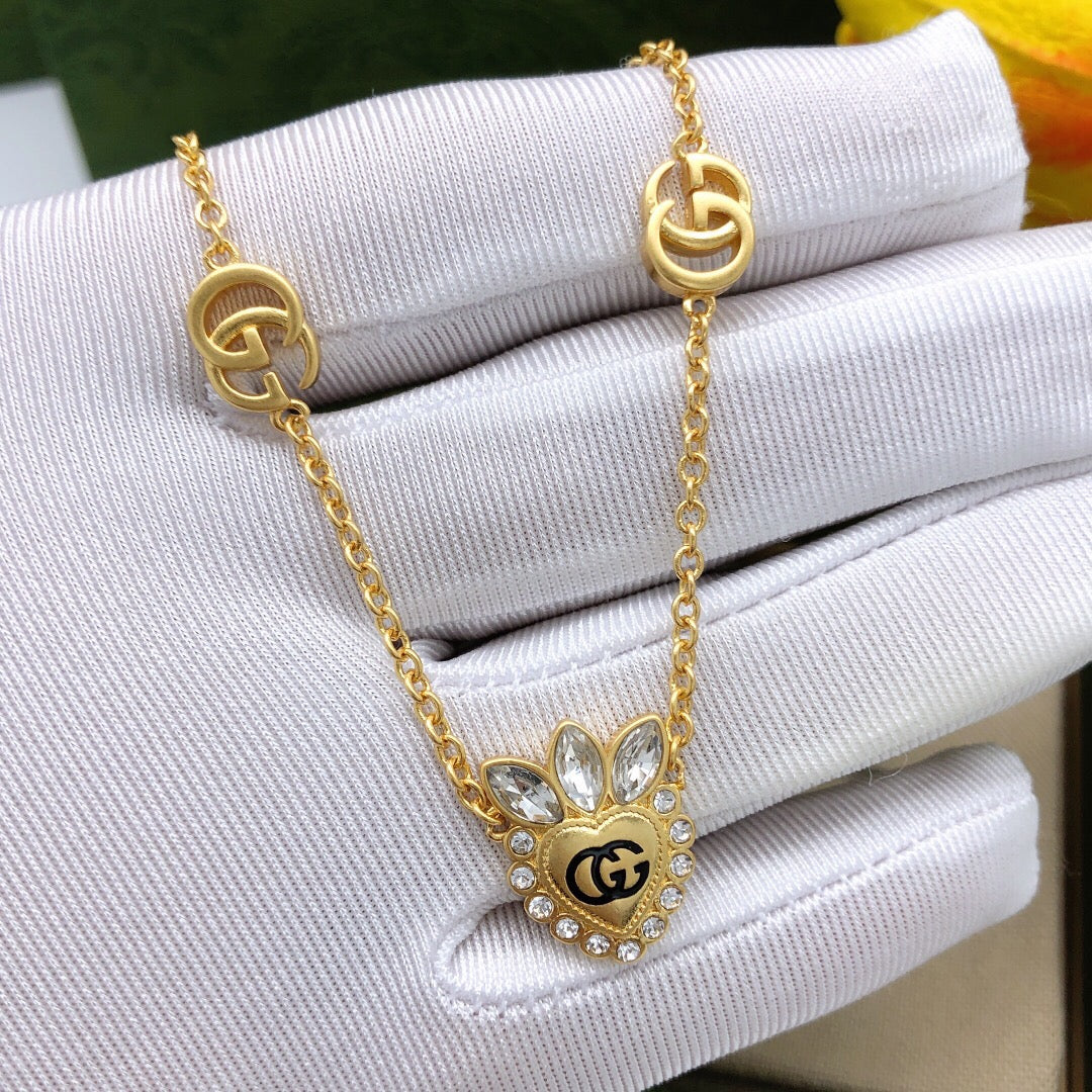 Gucci Interlocking G Heart Crystal Accent Necklace - album image 1