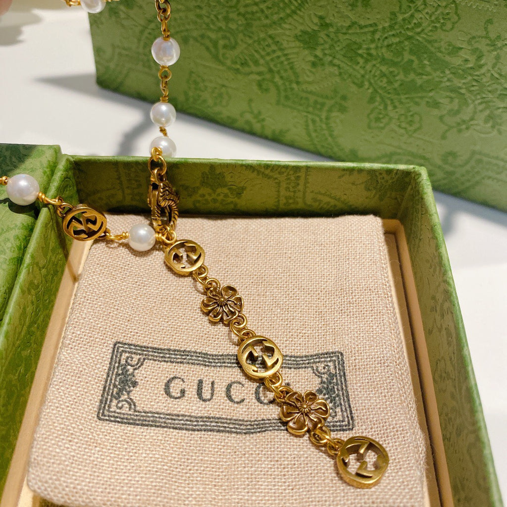 Gucci Pearl Flower Letter Necklace - album image 3