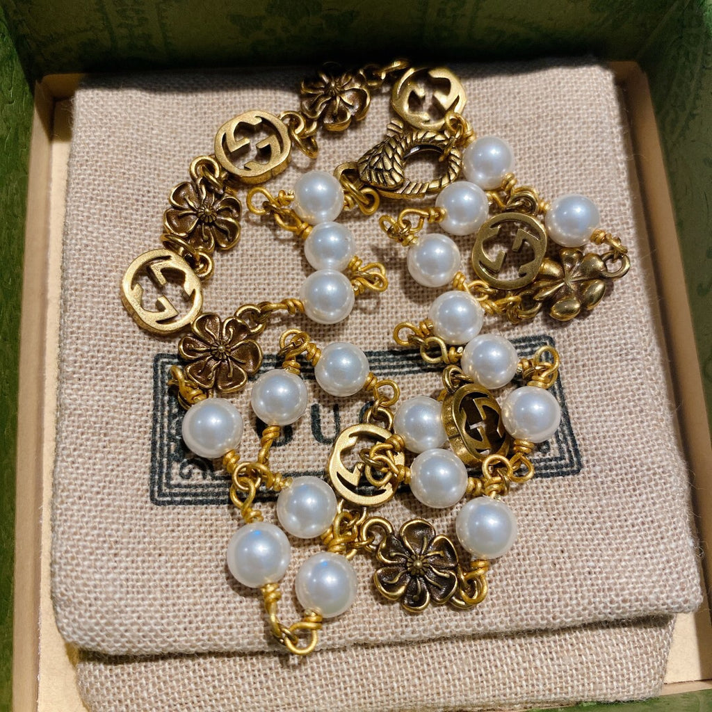 Gucci Pearl Flower Letter Necklace - album image 4