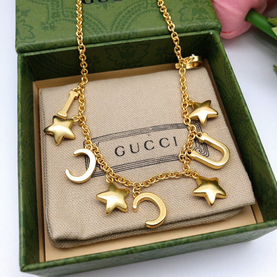 Gucci Interlocking G Star Crystal Accent Necklace - album image 5