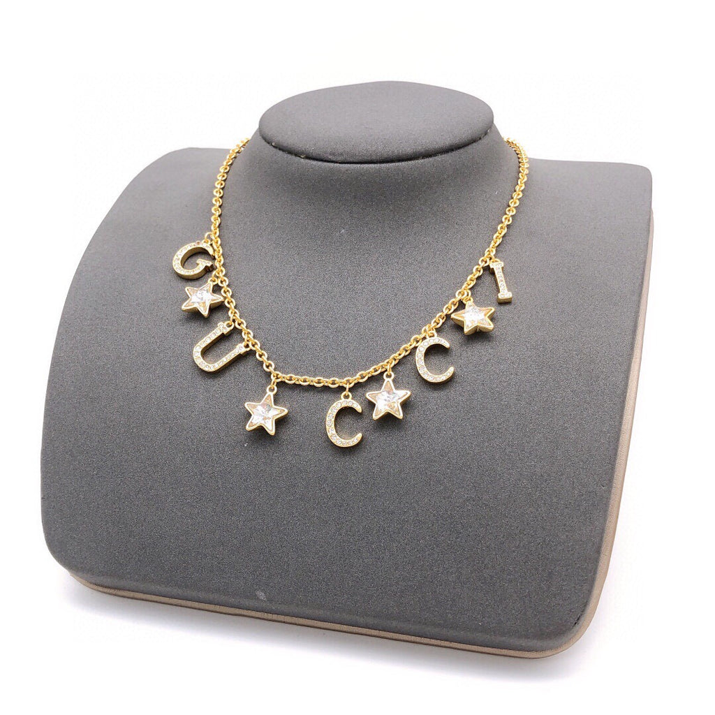 Gucci Interlocking G Star Crystal Accent Necklace - album image 1
