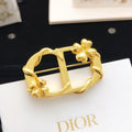 Dior Gold-Tone Floral CD Brooch - product image 1