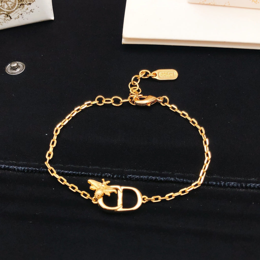 Dior Gold-Tone CD Star Bracelet - product image 1