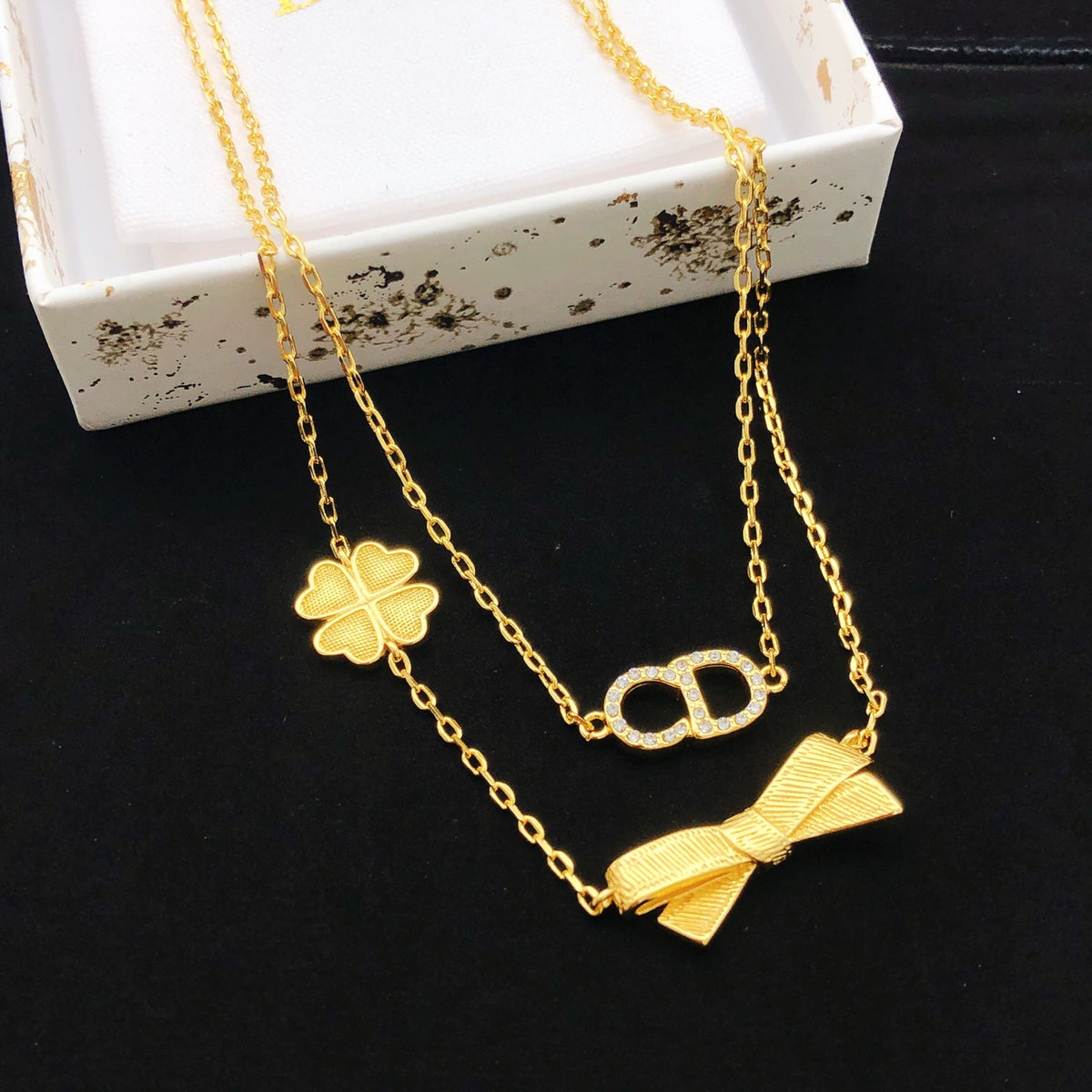 Dior Gold-Tone Layered Bow and Clover Necklace - product image 1