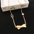 Dior Rose-Gold-Tone Sculpted Bow Necklace - product image 1
