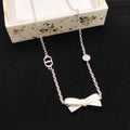 Dior Silver-Tone Sculpted Bow Necklace - product image 1