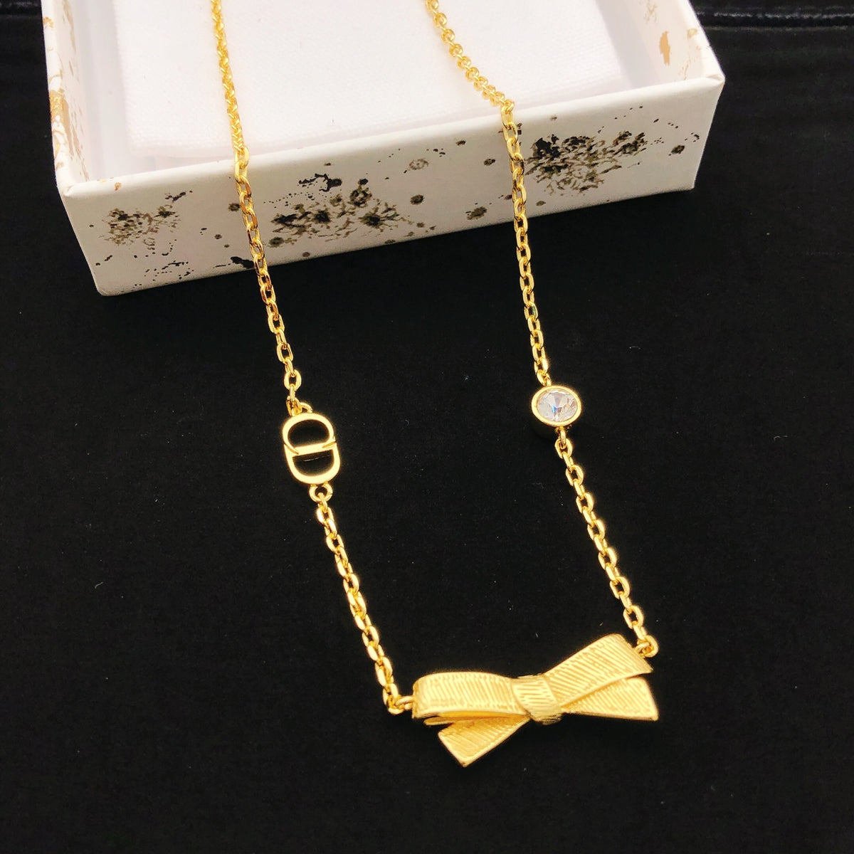 Dior Gold-Tone Sculpted Bow Necklace - product image 1