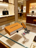Louis Vuitton Silver-Tone Outline Character Keychain - album image 1