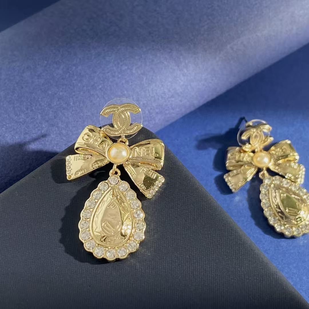 Chanel Interlocking C Bow Butterfly Gold-Tone Stud Earrings - album image 5