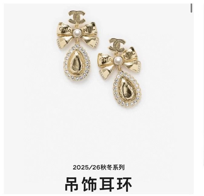 Chanel Interlocking C Bow Butterfly Gold-Tone Stud Earrings - album image 1