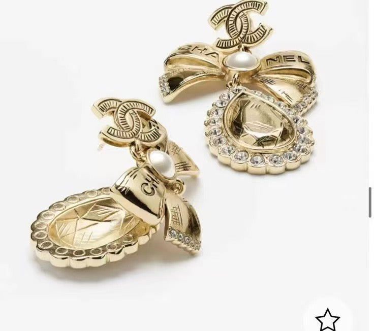 Chanel Interlocking C Bow Butterfly Gold-Tone Stud Earrings - album image 2