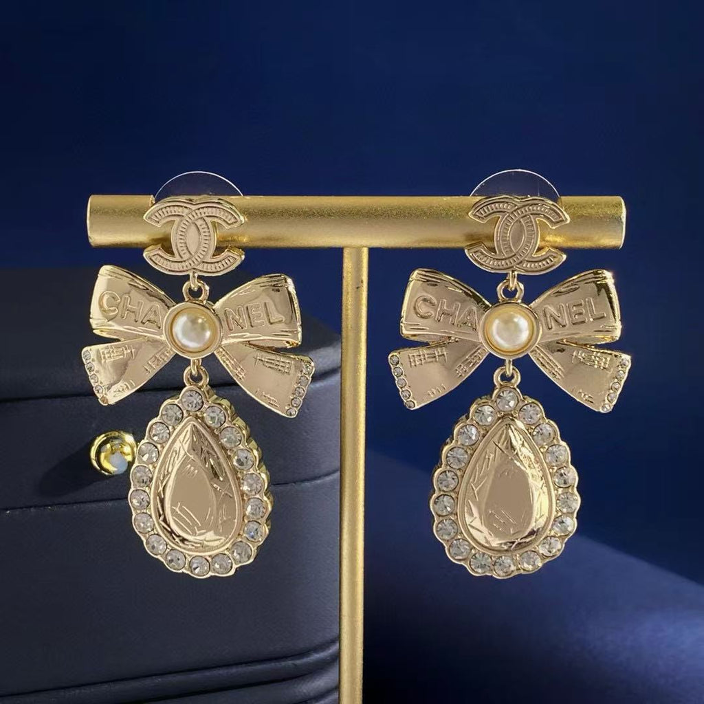 Chanel Interlocking C Bow Butterfly Gold-Tone Stud Earrings - album image 3