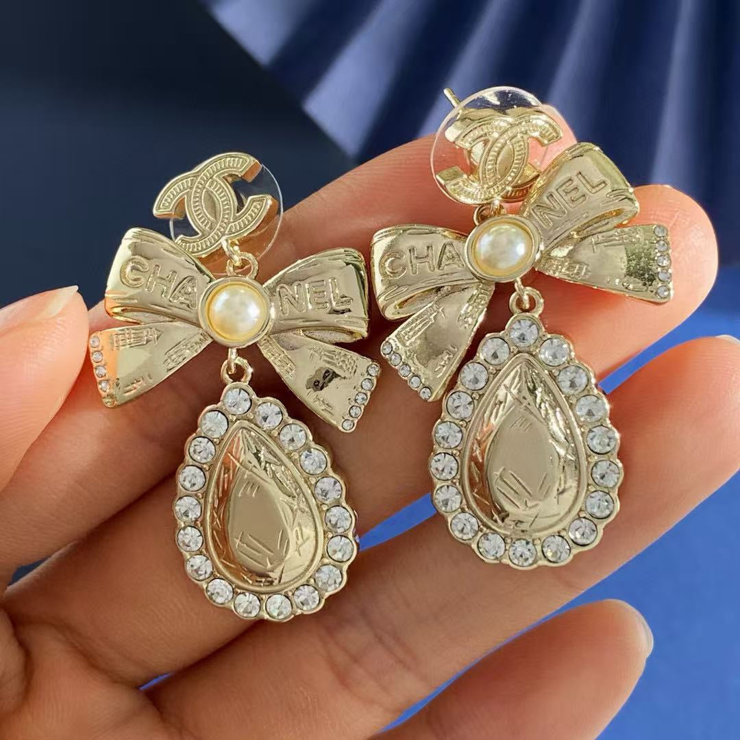 Chanel Interlocking C Bow Butterfly Gold-Tone Stud Earrings - album image 4