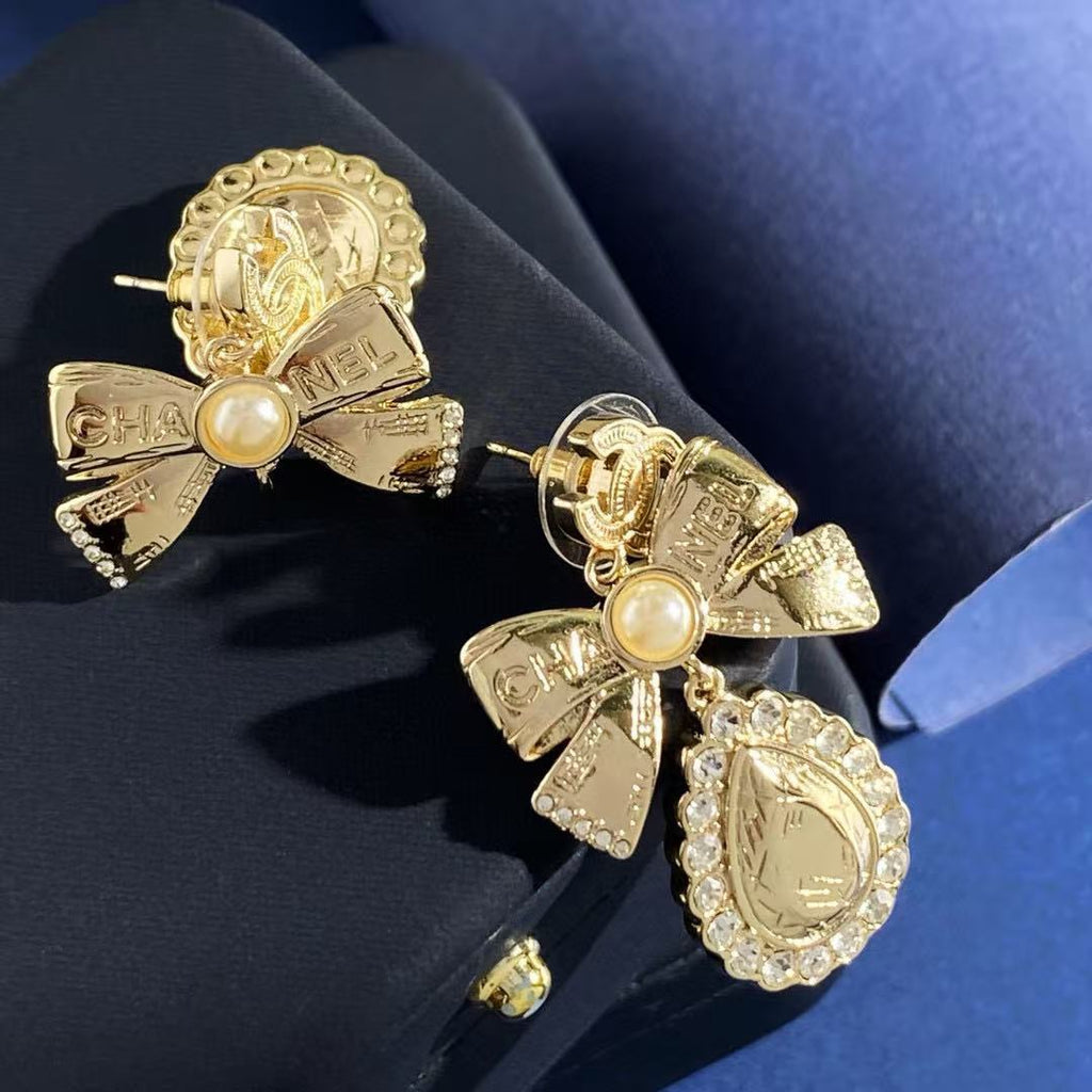 Chanel Interlocking C Bow Butterfly Gold-Tone Stud Earrings - album image 6