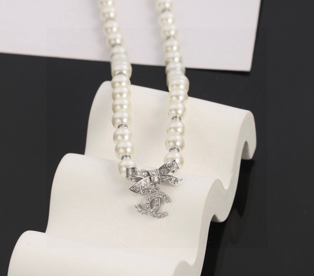 Chanel Bow Butterfly Pearl Circular Necklace - album image 1