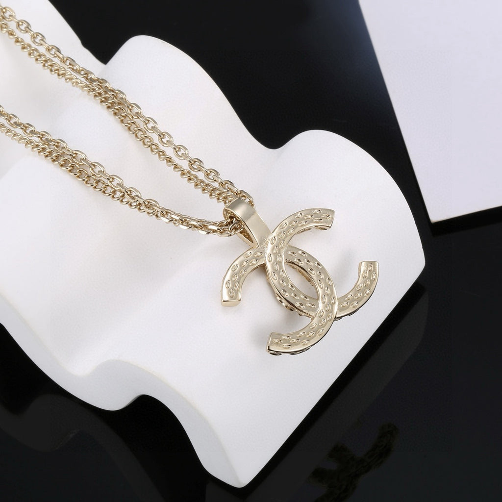 Chanel Gold-Tone Long CC Pendant Necklace - album image 7