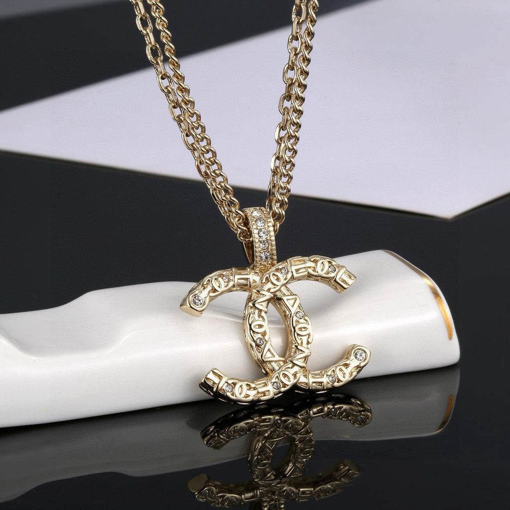 Chanel Gold-Tone Long CC Pendant Necklace - album image 6