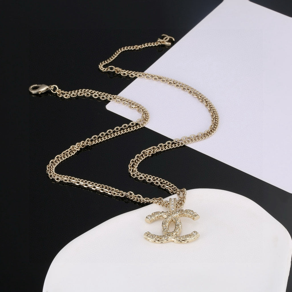 Chanel Gold-Tone Long CC Pendant Necklace - album image 3