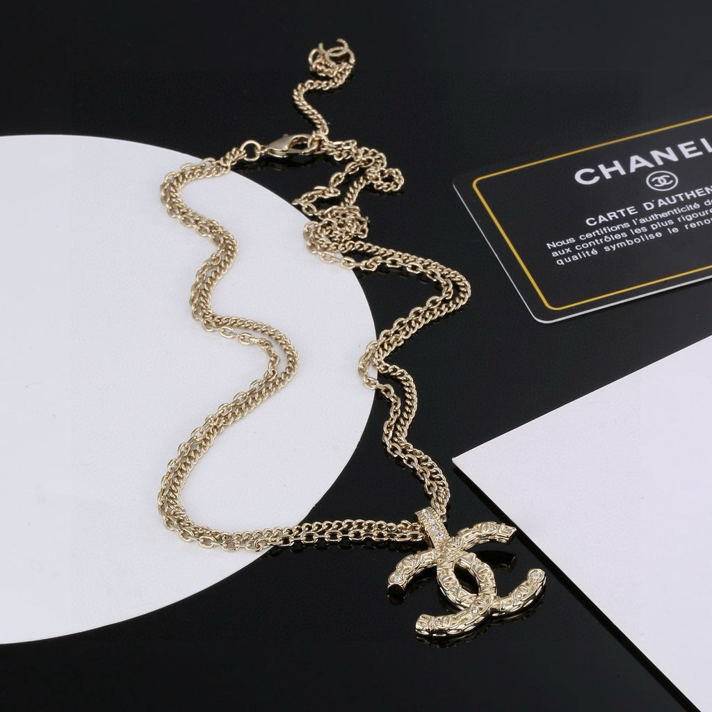Chanel Gold-Tone Long CC Pendant Necklace - album image 1