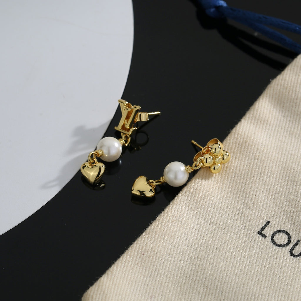 Louis Vuitton LV Letter Stud Earrings - album image 6