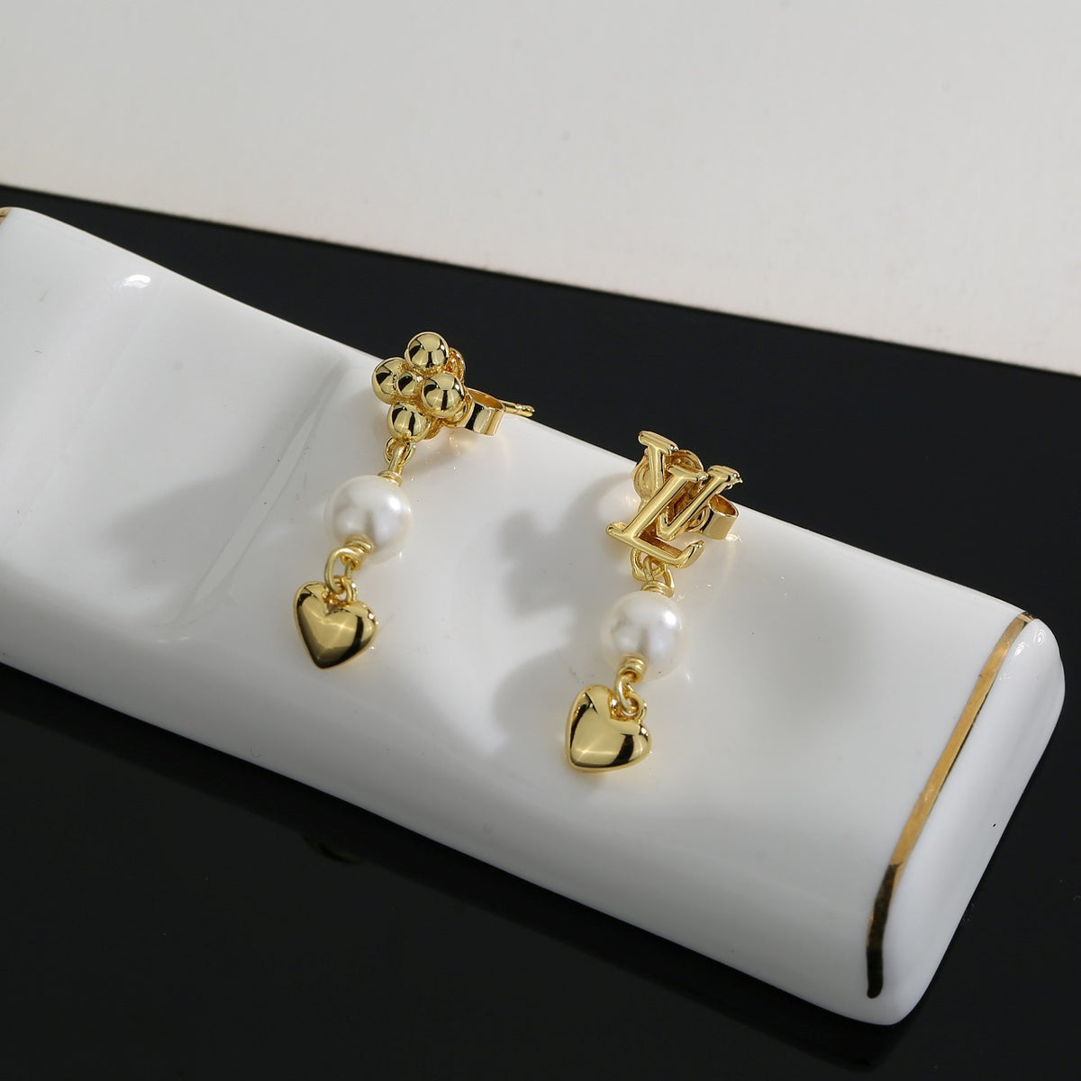 Louis Vuitton LV Letter Stud Earrings - album image 7