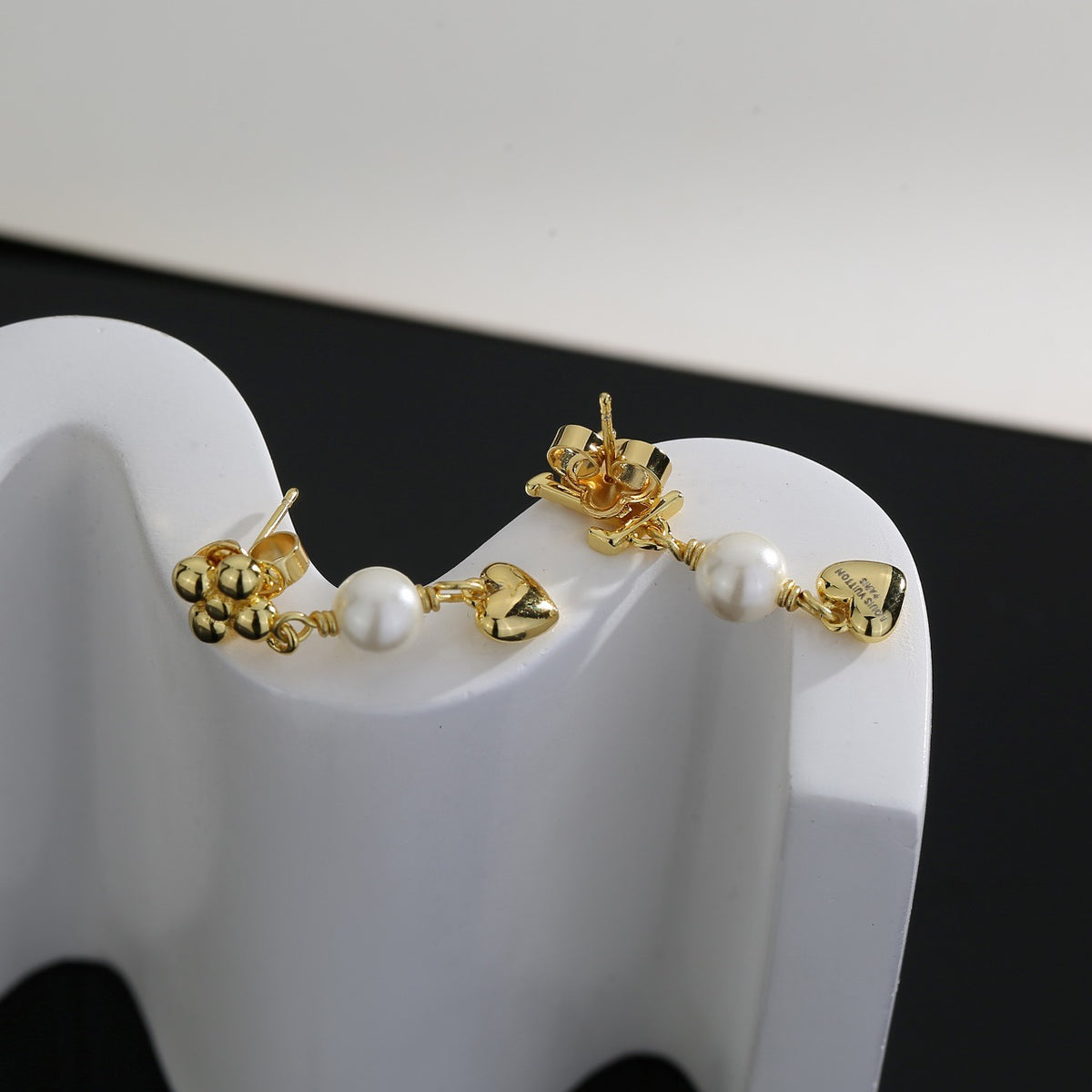 Louis Vuitton LV Letter Stud Earrings - album image 5