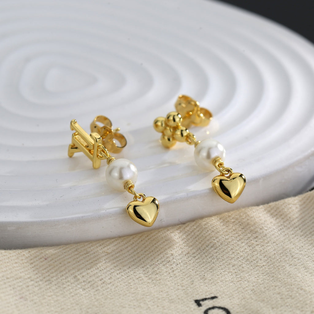 Louis Vuitton LV Letter Stud Earrings - album image 1
