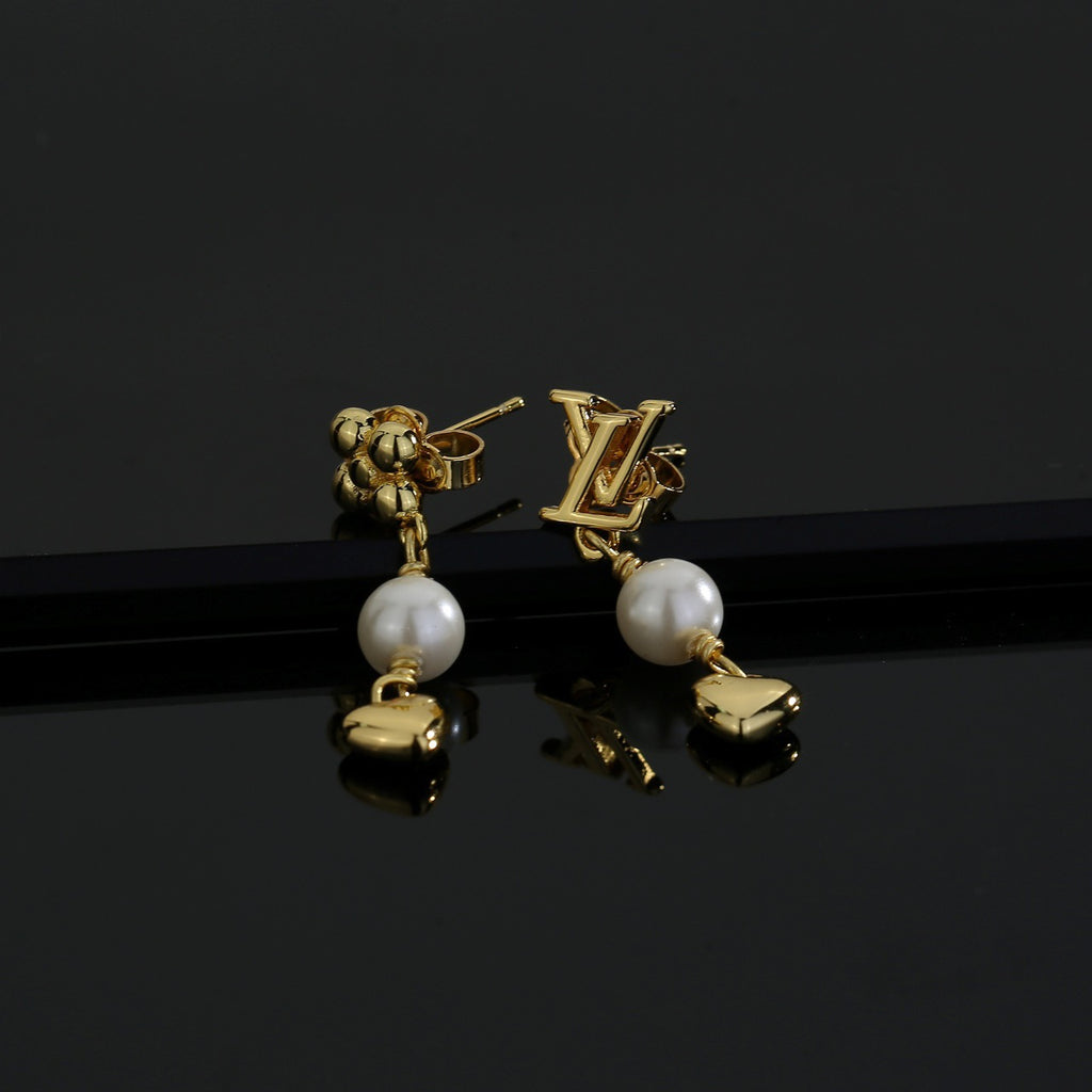 Louis Vuitton LV Letter Stud Earrings - album image 2