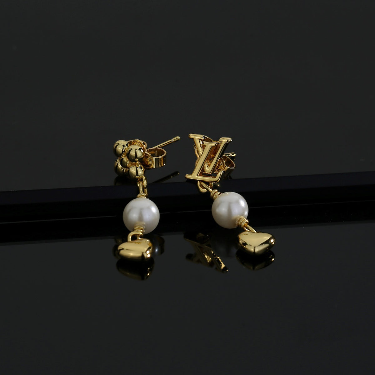 Louis Vuitton LV Letter Stud Earrings - album image 2