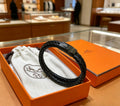 Hermès Black Leather H Cuff Bracelet - album image 1